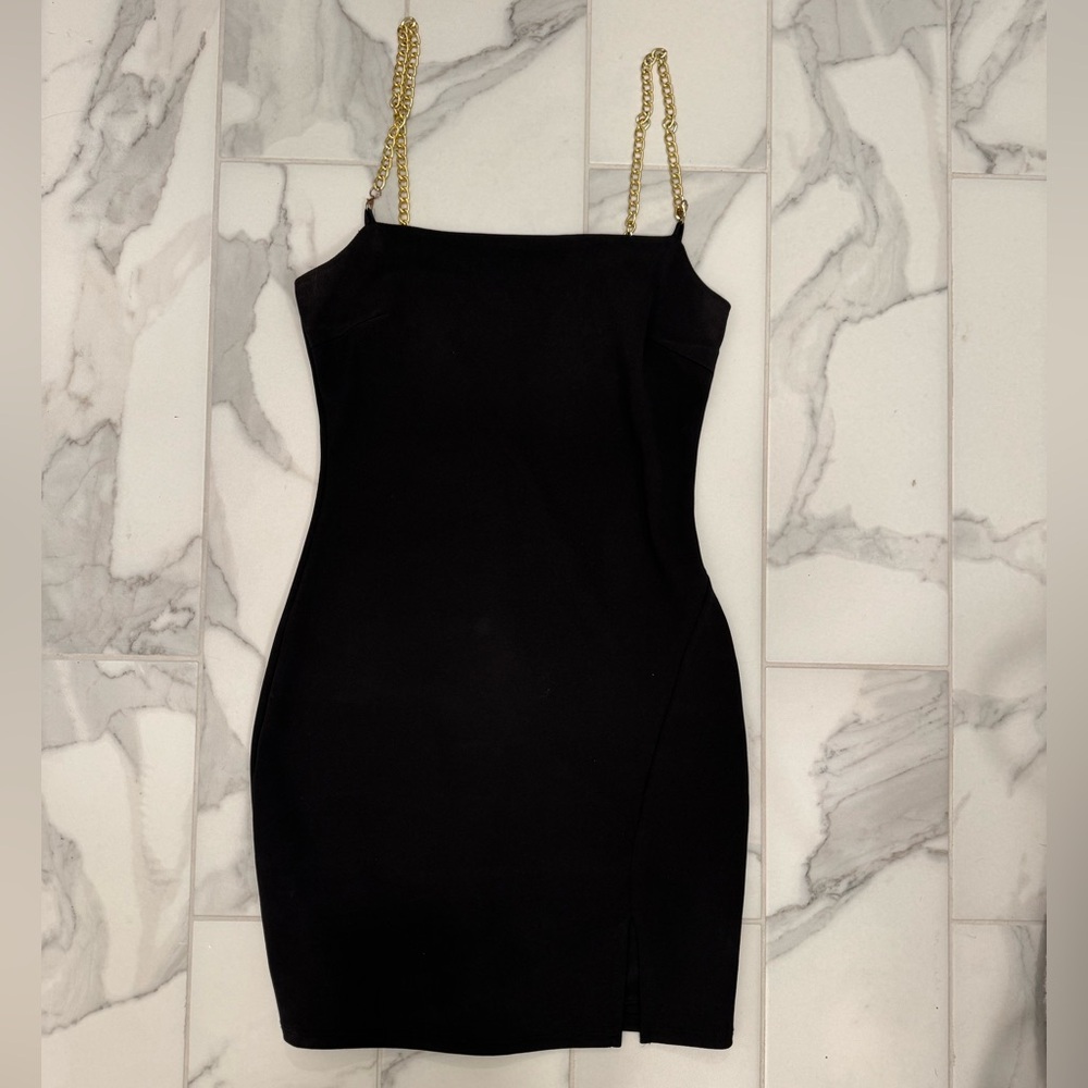 Black mini dress with gold chain straps